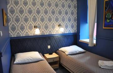 Фото номера Двухместный номер с 2 отдельными кроватями Отель Willa Impresja Hotel i Restauracja г. Пабьянице 4